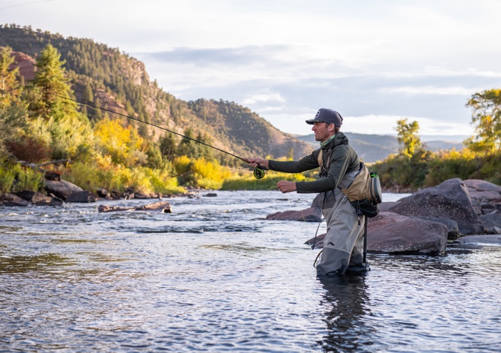 A man fishes in a Colorado river.