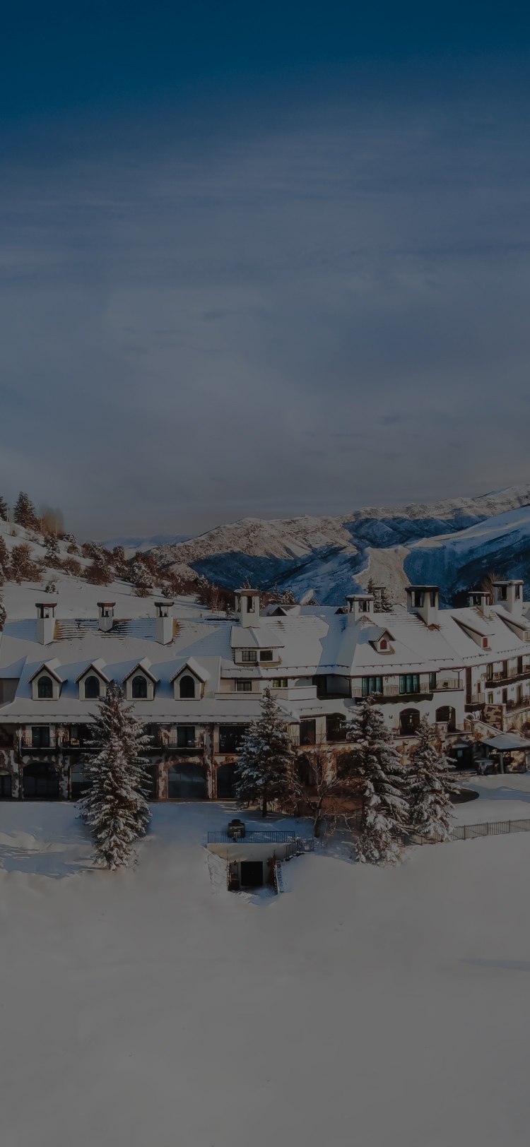 Aerial view of All Points North Lodge in winter.