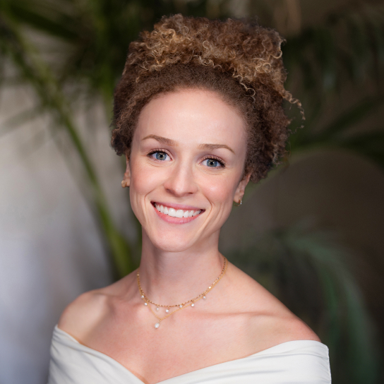 Headshot of Ella Moore.