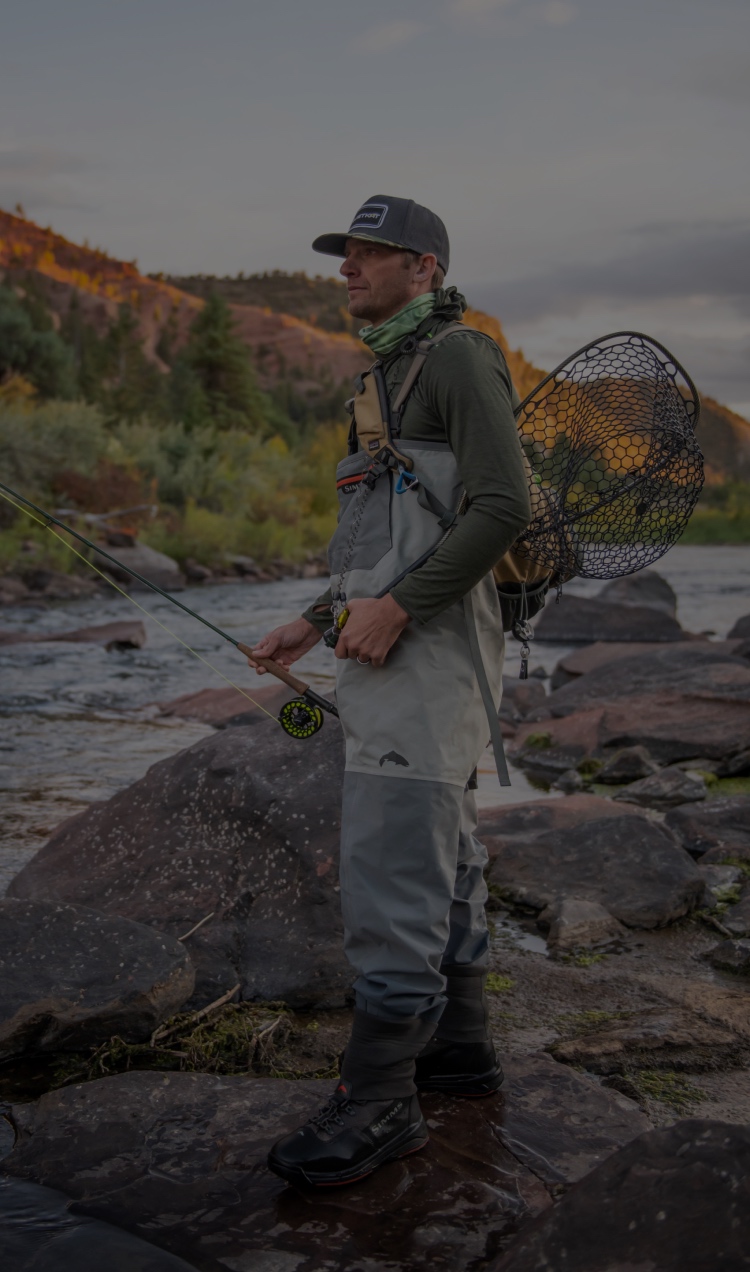 A man fishes in a Colorado river.