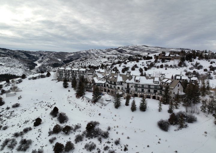 An aerial image of All Points North Lodge in the winter, covered in snow.