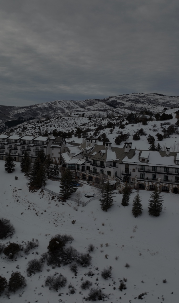 An aerial image of All Points North Lodge in the winter, covered in snow.