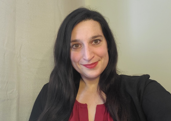 Karri Francisco, LMFT, smiling in her home office.
