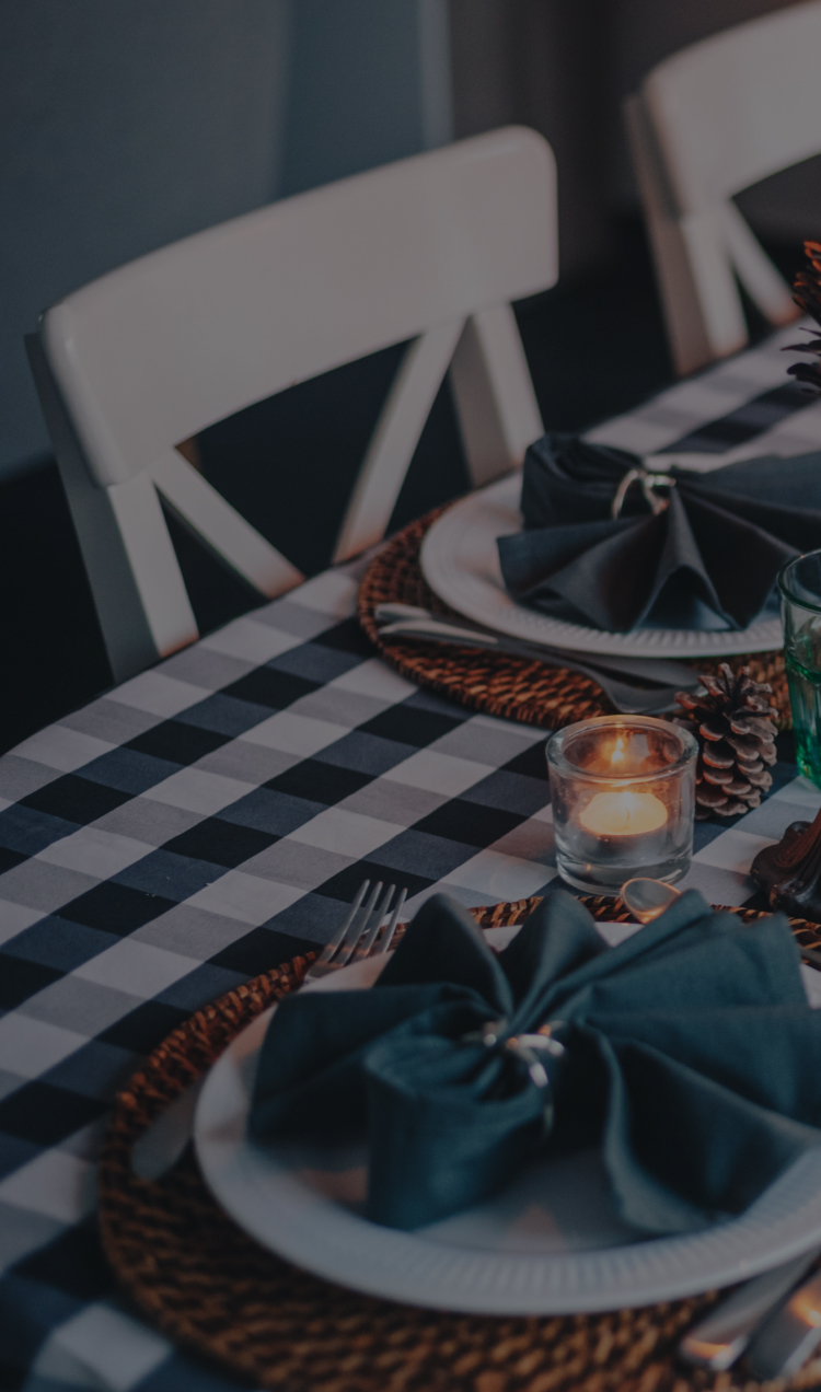 An empty chair at a holiday table.