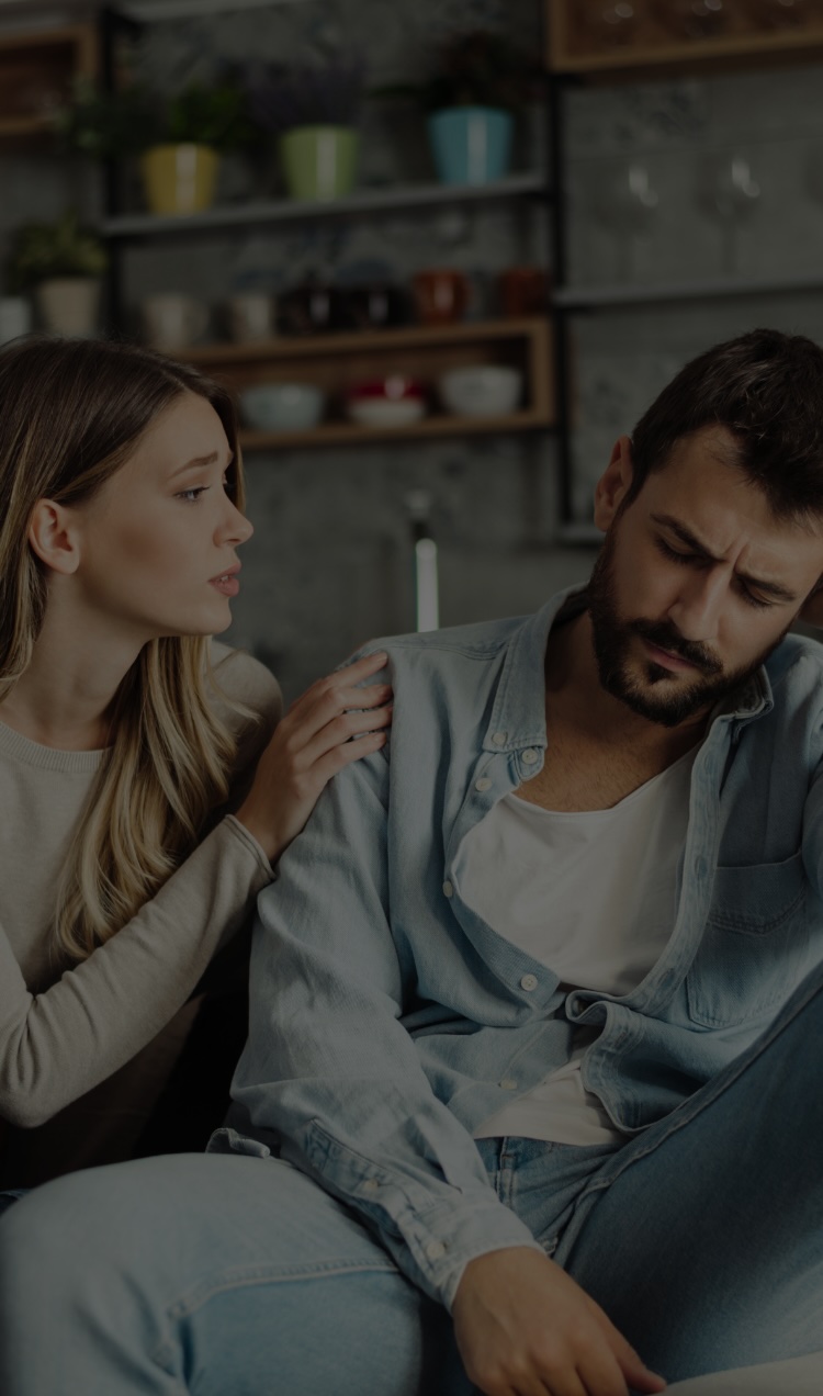 An upset couple struggling with people-pleasing.