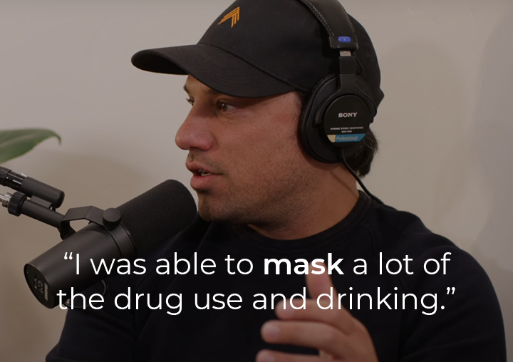 Dan Brody speaking into a podcast microphone with a text overlay: I was able to mask a lot of the drug use and drinking.