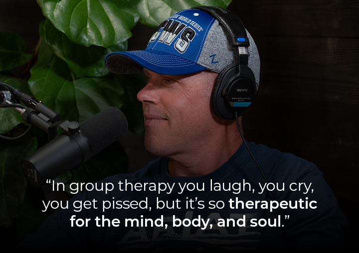 Dave speaking into a podcast microphone with a text overlay: In group therapy you laugh, you cry, you get pissed, but it’s so therapeutic for the mind, body, and soul.