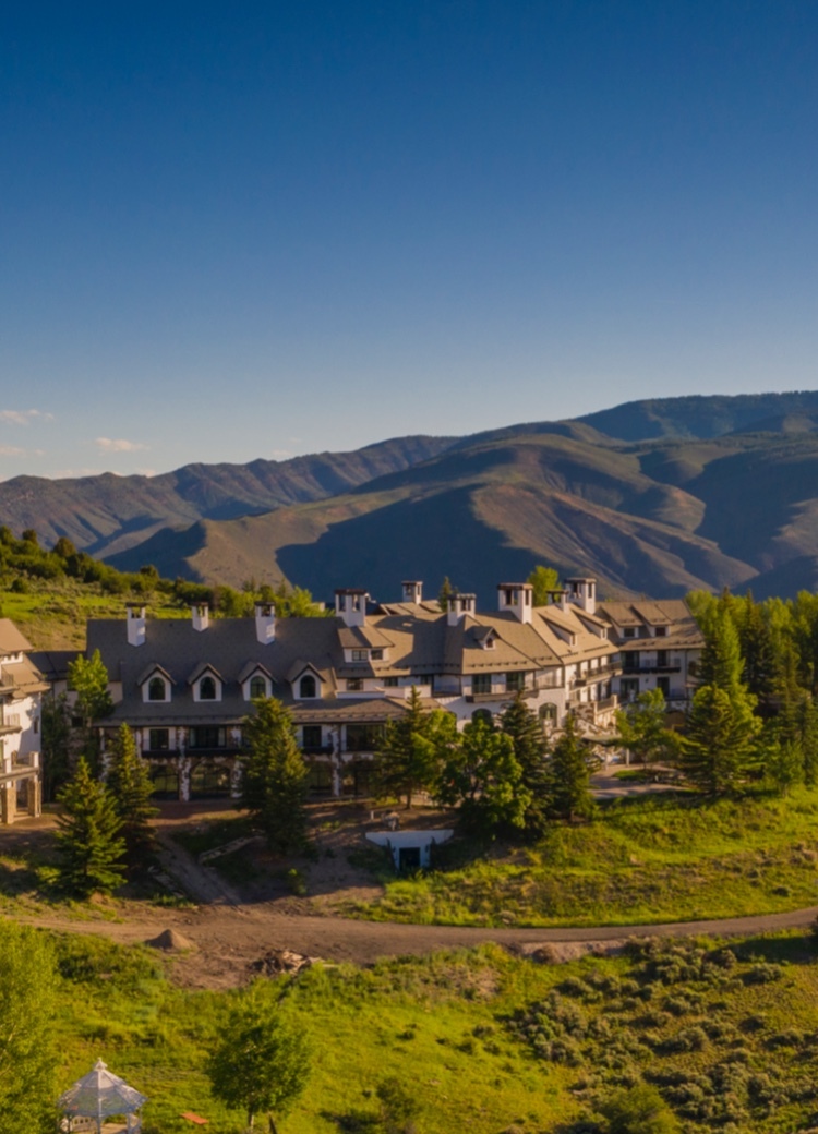 An aerial view of the All Points North Lodge in summer