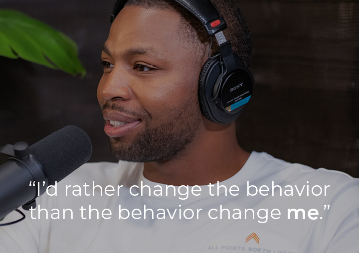 Turk McBride speaking into a podcast microphone with a text overlay: I'd rather change the behavior than the behavior change me.