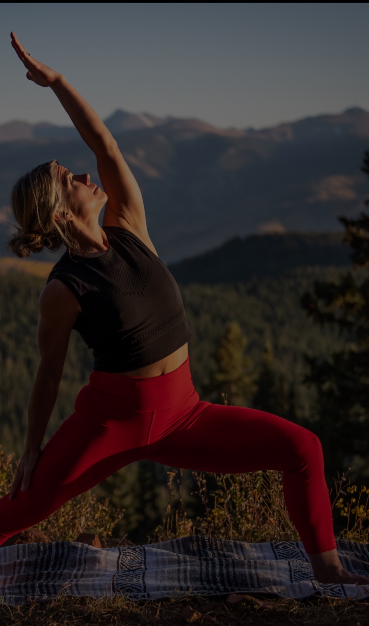 Woman Doing Yoga in Mountains