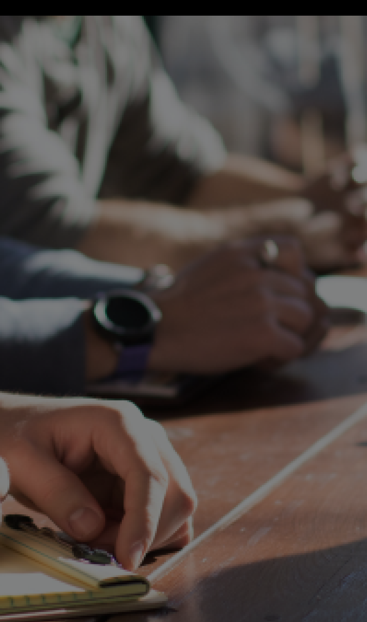 Hands on Table at a Meeting