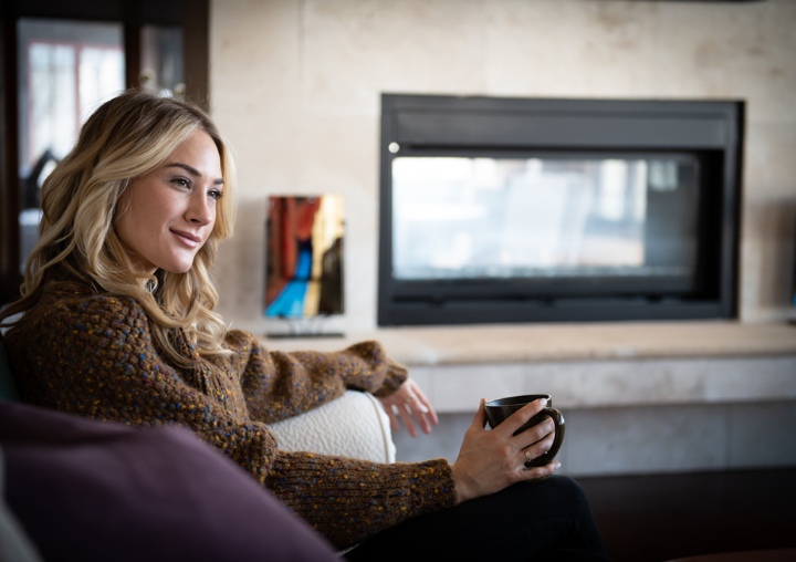 An APN Lodge client relaxes at a recovery residence.
