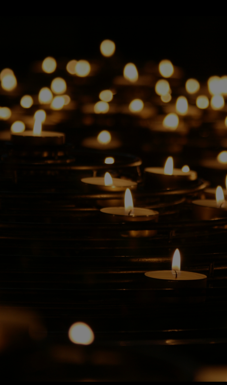 Floating tea light candles.