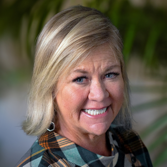 Headshot of Kristi Lewis.